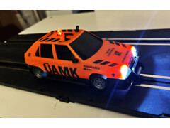 Favorit UAMK model SRC 1:28-  svítící světla , blikající oranžový maják. - motor 2O OOOotk. -K autodráze ITES, FARO, EuropaCup, Gonio .